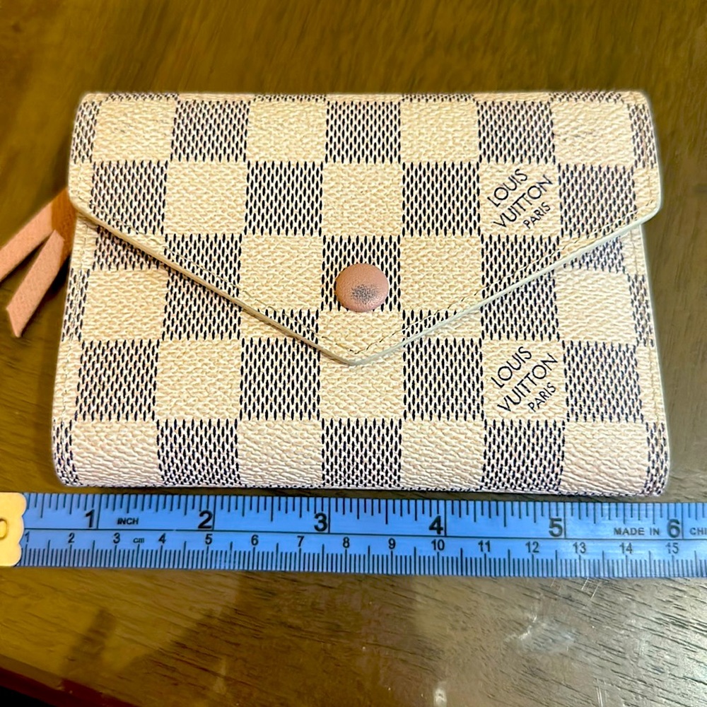 Pink and white checkered wallet